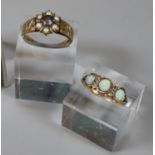 9ct gold flowerhead ring set with pearls and blue stone and an unmarked yellow metal ring set with