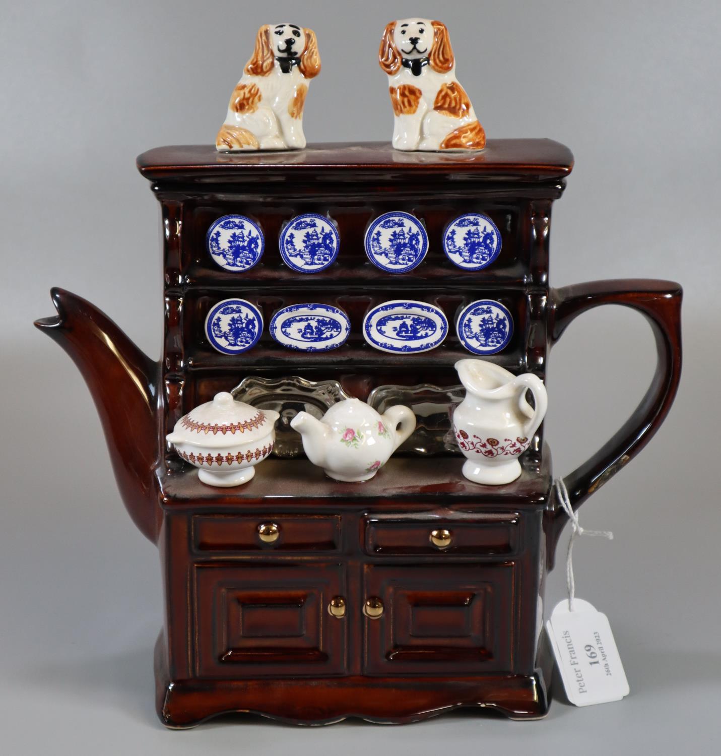 Novelty pottery brown glazed teapot in the form of a dresser. (B.P. 21% + VAT)