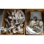 Two boxes of metalware, mostly silver plate to include: teapot, tray, milk jugs, sugar bowls,
