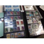 Commonwealth collection of mostly Royal event stamps in albums and stockbook, 100s mint and used. (