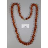 An amber bead necklace. (B.P. 21% + VAT)