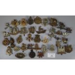Collection of assorted British military cap badges including : The Royal Dragoons, 3rd Battalion