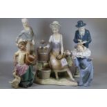 Collection of five Lladro, Nao and Spanish porcelain figurines, various to include: matt finish