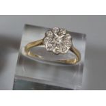 18ct gold diamond daisy/flower head ring, 2.8g approx. Ring size P. (B.P. 21% + VAT)