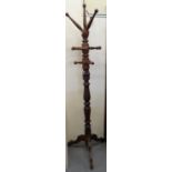 Victorian style mahogany finish coat and hat stand on a triform base. (Modern) (B.P. 21% + VAT)