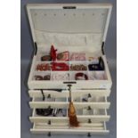 Modern cream and floral ladies jewellery box, the interior revealing assorted costume and other