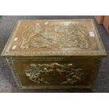 Brass covered toy or wood box with armorial designs to top and lid. (B.P. 21% + VAT)