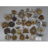 Collection of British military cap badges, various to include: The Queen's, The Welch etc. (B.P. 21%