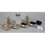 Collection of silver condiments, some with blue glass liners together with a cut glass and silver