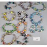 Collection of charm bracelets, glass beaded charms etc. (B.P. 21% + VAT)