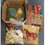 Box of woollen needlepoint and fabric cushions to include; animal designs, carpet cushions etc. (