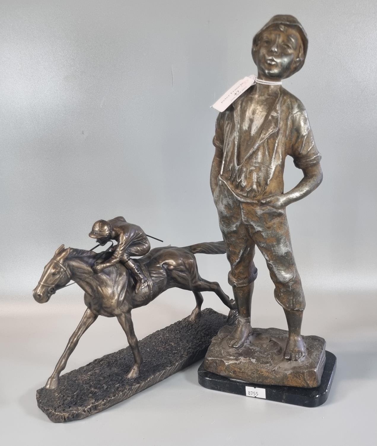 Composition bronzed modern study of a horse and jockey, together with a white metal figure of a