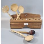 Traditional single tier oak spoon rack with five cawl spoons. (B.P. 21% + VAT)