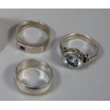 Three assorted silver rings, one set with blue stone. (3) (B.P. 21% + VAT)