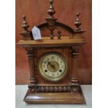 Early 20th Century walnut probably German architectural two train mantel clock. (B.P. 21% + VAT)