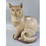 Modern ceramic study of a stylised seated cat. 40cm high approx. (B.P. 21% + VAT)