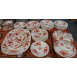 Five trays of 19th Century gilt and red floral pattern dinnerware to include: various sizes of