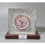 Waterford crystal quartz mantel clock on wooden stand. (B.P. 21% + VAT)