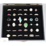 36 cased and hallmarked silver rings with coloured stones. (B.P. 21% + VAT)