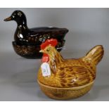 Price Kensington pottery egg crock in the form of a hen, together with another brown glazed egg
