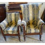 Two similar 19th century mahogany framed upholstered armchairs, both standing on fluted legs and