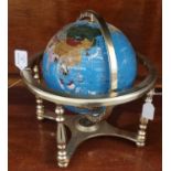 Modern chrome finish and hardstone revolving table globe. (B.P. 21% + VAT)