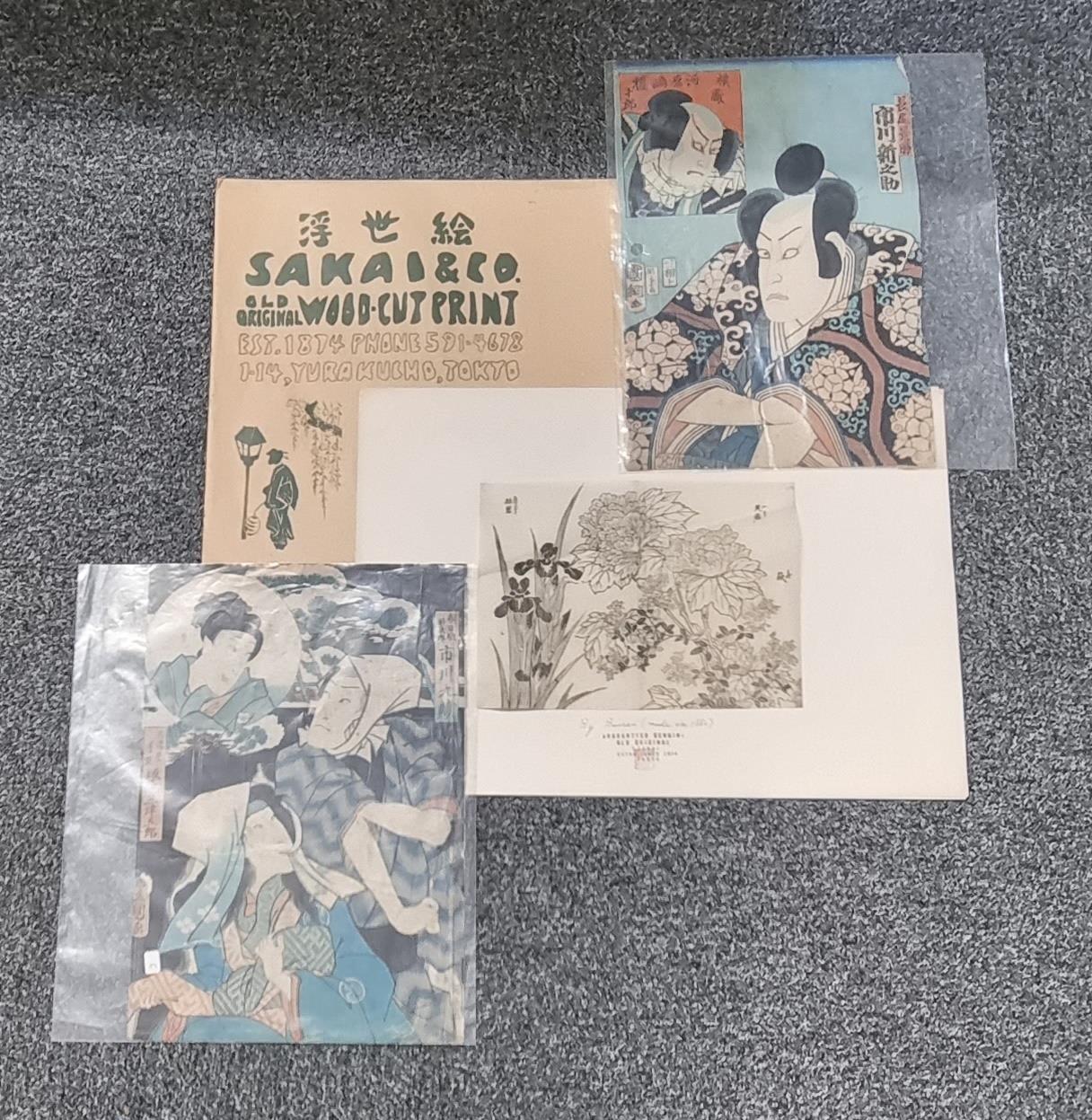 Three unframed Japanese woodblock prints, two figure studies and one floral 19th Century mounted