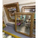 Two similar 19th century gilt framed gesso mirrors, one with bevelled plate, both decorated with