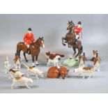 Beswick hunting group, to include: 868 horse and huntsman, another horse and seated huntsman, hounds