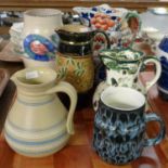 Collection of ceramics, to include: Poole pottery jug, Poole pottery vase, Doulton jugs, large