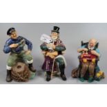 Three Royal Doulton bone china figurines, to include: 'The Coachman', 'The Toymaker' and 'The