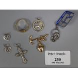 9ct gold collection of charms, to include: cross, heart and anchor, 1.6g approx. together with a