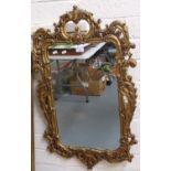 Rococo style gilt framed mirror (modern). 96x56cm approx. (B.P. 21% + VAT)