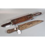 Asian carving set with wooden sheath/stand together with another similar knife marked 'India' in