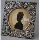 Art Nouveau easel silver picture frame embossed with cherubs and silhouette of a Victorian lady. (