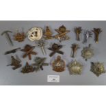 Various British Military cap badges, to include: War Raised Units, Machine Gun Corps and others,