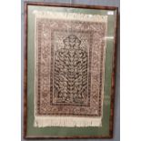 Middle Eastern unidirectional prayer mat of 'Tree of Life' foliate design. Framed and glazed. The