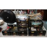 Collection of eight Burago 1:18 scale diecast model vehicles, all in original boxes, to include: