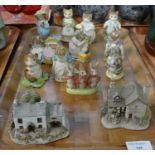 Collection of Royal Albert Beatrix Potter figurines together with two Lilliput Lane cottages. (B.