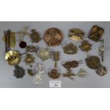 Large collection of British Military cap badges, including: Rifle Insignia, Lothians Border Horse