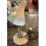 Modern angle poise table lamp on a circular base. (B.P. 21% + VAT)