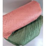 Handmade antique cotton Welsh quilt in pink and green with pink square centre and green edge, sewn