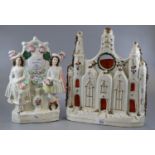 Two 19th century Staffordshire Flatbacks, to include: Clock Tower and a figure group with clock to