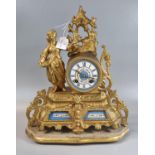 French gilt spelter porcelain mounted figural mantle clock on velvet covered separate stand.