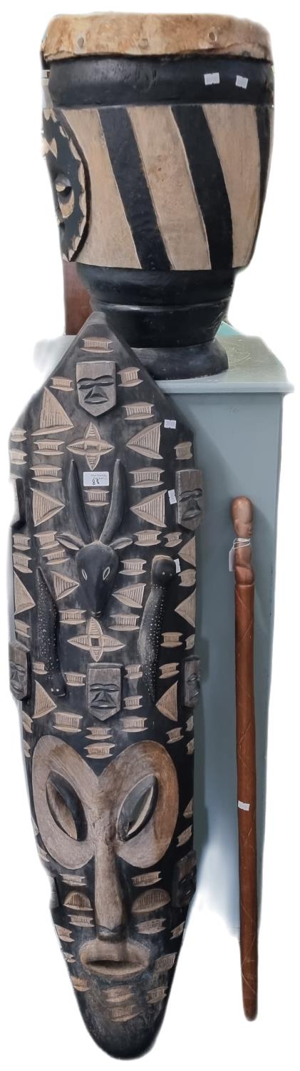 Collection of African artifacts, to include: carved face mask, tribal drum and a Kenyan hardwood