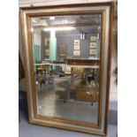 Modern gilt and silver framed bevel plate mirror. 70x105cm approx. (B.P. 21% + VAT)