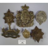 Collection of British Military helmet plates, some Scottish and others. (B.P. 21% + VAT)