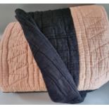 Handmade light pink and black cotton quilt, pink inner with sewn in diamond patterns and black