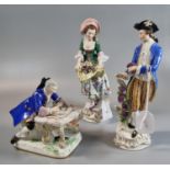 Pair of German porcelain figurines of lady and gent with grapes together with another German Meissen