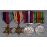 WWII Medal group, to include: 1939-45 War Medal, Defence Medal, 1939-45 Star and Africa Star.